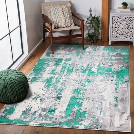 Abstract Rugs by Renoazul - bold abstract pattern rug with fluid flowing design, available in Beige, Emerald, Grey, Navy, Ochre, and Pink, shown as a stylish floor accent for living room, bedroom, or dining room UK interiors.