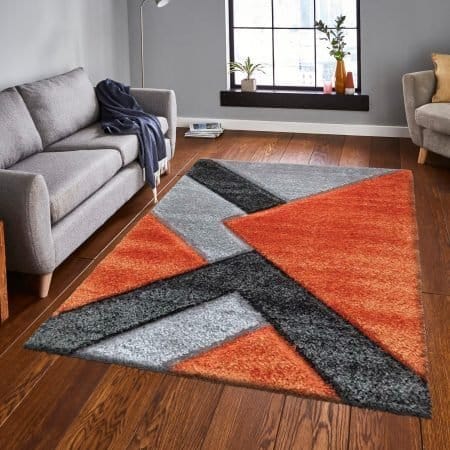 Nova Rugs by Renoazul - two-tone rug collection available in colourways including Black & Grey, Blue & Grey, Grey & Ochre, Pink & Grey, and Red & Grey, offered in 6 sizes up to 200 x 290 cm, styled for living room, bedroom, and study interiors in UK homes.